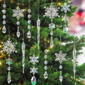 Detail view of 18 iridescent acrylic Christmas ornaments hanging on a tree with lights.