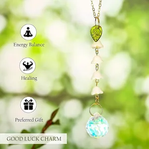 Close-up of lily of the valley suncatcher ornament with a sparkling crystal ball