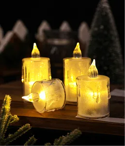 Close-up of sparkling crystal LED candle lamps with warm yellow light decoration