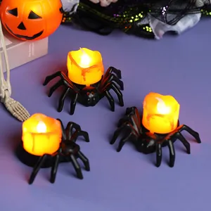 Set mit drei Halloween-Spinne-LED-Elektronikkerzen mit warmem orangefarbenem Flackern