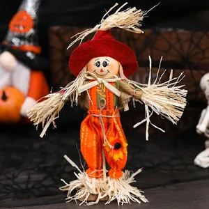 Handcrafted standing Halloween scarecrow ornament for autumn harvest and holiday home decor.