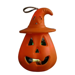 Orange Halloween pumpkin lantern with witch hat and internal LED light decoration