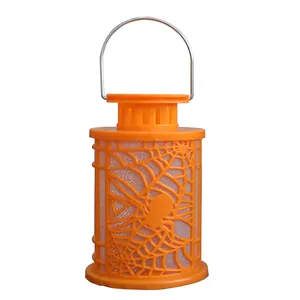 Portable orange Halloween lantern featuring a glowing spider web pattern and metal handle