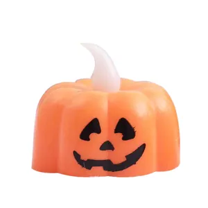 Halloween pumpkin LED tea light candle with classic jack-o'-lantern face for decorations