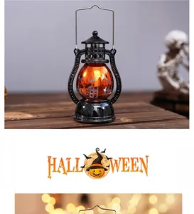 Close-up of vintage Halloween lantern with glowing orange pumpkin globe and bat patterns