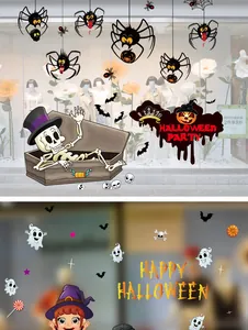 Detail van Halloween raamstickers met spoken en spinnen op een etalage van een winkel