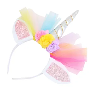 Adorable rainbow unicorn headband with silver horn and glittery pink ears for little girls