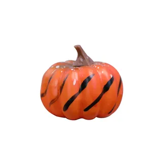 Realistic orange artificial pumpkin with black tiger stripes for Halloween home decoration