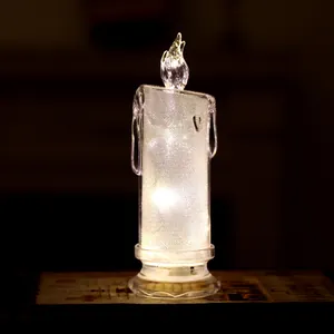 Elegante candela a LED argento scintillante con calda luce bianca per decorazione