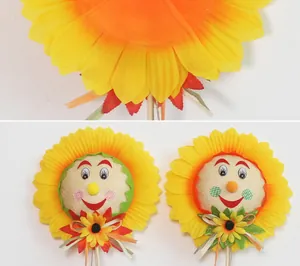 Dettaglio di decorazioni a girasole con facce sorridenti per decorazioni Halloween