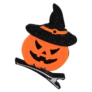 Halloween children's hair clip with glitter witch hat and felt pumpkin design