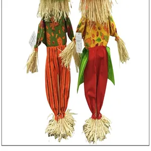 Detail of standing harvest festival scarecrow ornaments for Halloween venue decor