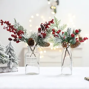 Artificial snowy cedar branch with berries and pinecones for Christmas tabletop decor