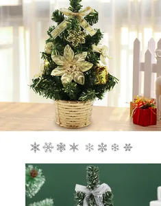 Petit sapin de Noël artificiel en pot doré décoré d'ornements dorés scintillants