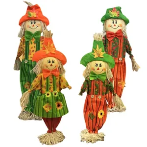 Set of cute standing Harvest Festival scarecrow dolls for Halloween home party decor