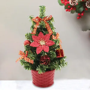 Mini sapin de Noël artificiel en pot avec nœuds rouges et fleurs pour décoration de fête