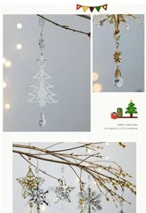 Detailansicht von silbernem Weihnachtsschmuck aus Metall mit edlen Kristallperlen