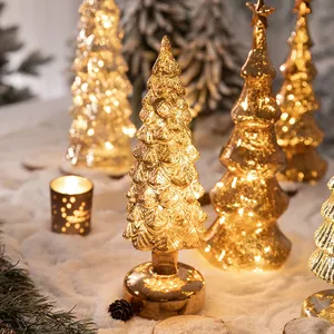 Elegant golden mercury glass Christmas tree ornament with warm LED lights for decor