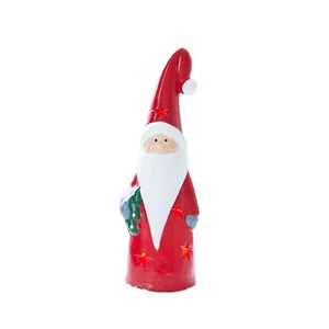 Keramik-Weihnachtsmann-Figur mit leuchtenden Sternen für weihnachtliche Tischdeko