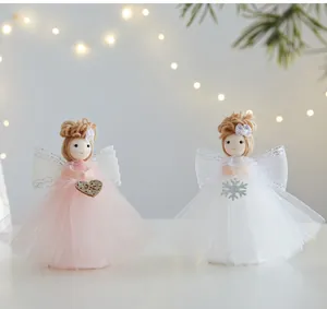 Charming Christmas angel girl ornaments in pink and white tulle skirts with yarn hair