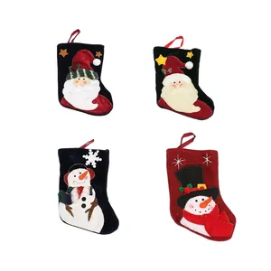Set of 4 mini Christmas stocking gift bags with Santa and Snowman designs for tree decor