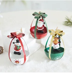 Set of three Christmas metal hanging ornaments featuring Santa, snowman, and reindeer figurines
