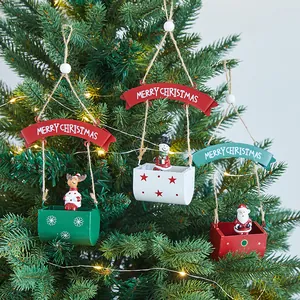 Set of 4 festive metal Christmas tree ornaments featuring Santa and Snowman mailbox designs