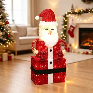 Glowing 3D Santa Claus figure made of red sequined gift boxes for Christmas decor