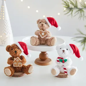 Festive plush Christmas teddy bears wearing Santa hats for holiday home decoration.
