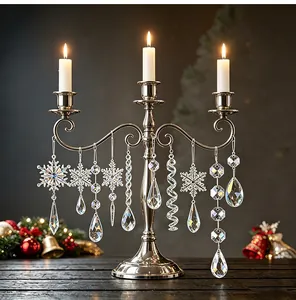 Clear acrylic Christmas snowflake and icicle ornament set hanging on a candelabra