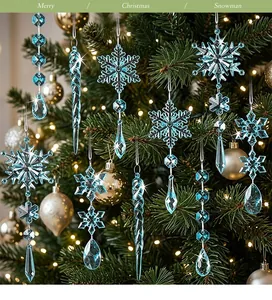 Close-up of blue acrylic snowflake and icicle ornaments hanging on a Christmas tree