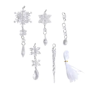 Transparent acrylic snowflake and icicle Christmas tree ornaments set with white ribbon