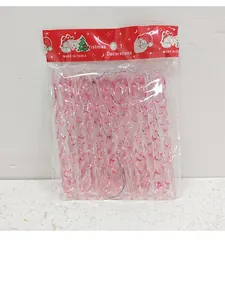 Detail of pink transparent spiral Christmas icicle ornaments in retail packaging