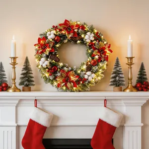 Artificial Christmas wreath with LED lights and red poinsettias for holiday home decor