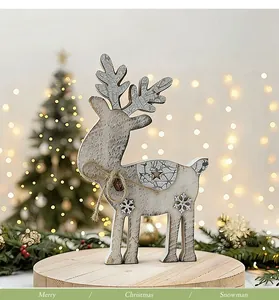 Detailed view of a wooden Christmas reindeer ornament with rustic texture and snowflake accents.