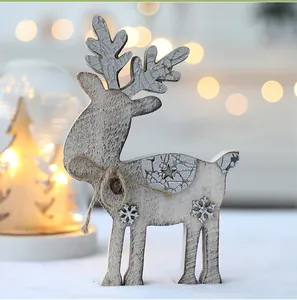 Close-up of a rustic wooden reindeer figurine with festive snowflake decorations.