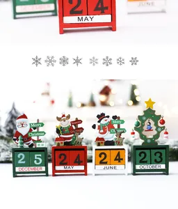 Detailed view of four wooden Christmas desktop calendars with holiday characters
