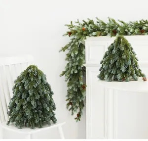 Realistic PE mini Christmas trees arranged on white furniture for festive home decor