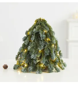 Mini PE Nordmann fir Christmas tree with warm LED lights for cozy tabletop holiday decoration