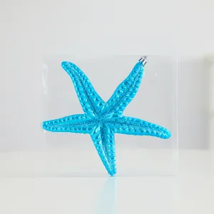 Creative bright blue starfish Christmas tree ornament in clear plastic gift box packaging