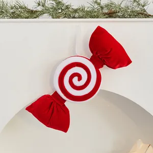 Festive red and white velvet peppermint candy hanging decoration for Christmas tree decor