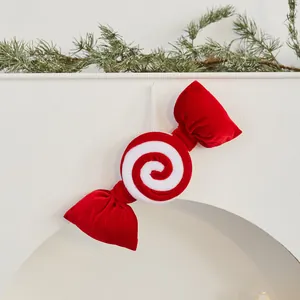 Red velvet Christmas candy ornament with white spiral design for holiday decoration