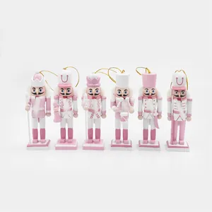 Zes roze en witte houten notenkraker soldaat hangende ornamenten voor het kerstfeest
