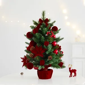 Pre-lit mini artificial Christmas tree with red velvet ornaments and pine cones for tabletop