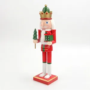 Handcrafted 38cm wooden nutcracker soldier with tree and gift detail