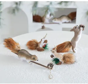 Detailed view of realistic squirrel ornaments with fluffy tails for Christmas decor