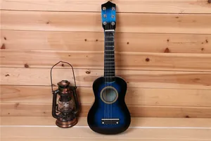 Vue détaillée de la guitare 21 pouces pour enfants en bleu dégradé.