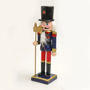 Close-up of a 25cm classic wooden nutcracker soldier figure with golden axe decoration