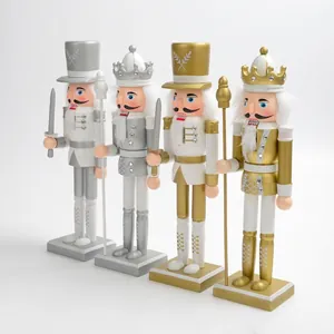 Set of four 30cm gold and silver wooden nutcracker soldier figurines for Christmas