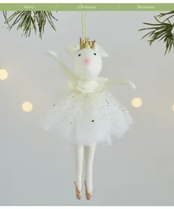 Detailed view of plush ballerina mouse ornament with gold crown and sparkling tutu